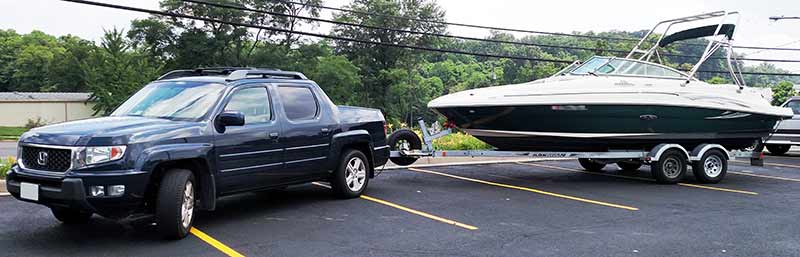 honda ridge line towing a boat safely