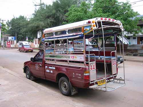 taxi truck thailand causes concern for towing due to unbalanced load in the bed of truck